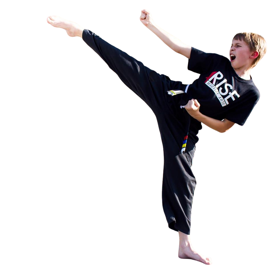 Boy Using high Karate Kick in pflugerville class