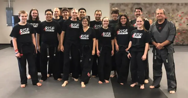 Adult students smiling after class in Pflugerville